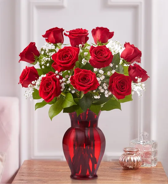Dozen red roses with babies breath in a red vase for same day fresh flowers delivery by local florist near Livermore,Pleasanton , Dublin