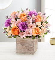 
              alstroemerias and peach roses with lavender carnations
            