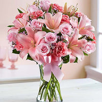 Pink roses with pink lilies and pink carnations in a vase for same day fresh flowers delivery by local florist near Livermore,Pleasanton , Dublin