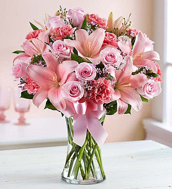 Pink roses with pink lilies and pink carnations in a vase for same day fresh flowers delivery by local florist near Livermore,Pleasanton , Dublin