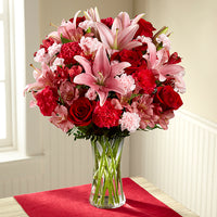 Pink lilies with red roses , red carnations and pink alstroemerias same day fresh flowers delivery by local florist near Livermore,Pleasanton , Dublin