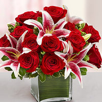 Red roses with stargazers in a glass cube vase for same day fresh flowers delivery by local florist near Livermore,Pleasanton , Dublin