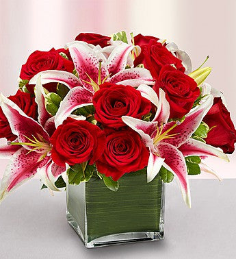 Red roses with stargazers in a glass cube vase for same day fresh flowers delivery by local florist near Livermore,Pleasanton , Dublin