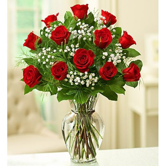 Dozen Red Roses arranged in a clear vase with babies breath Same day flowers delivery by local florist near Livermore, Pleasanton, Dublin