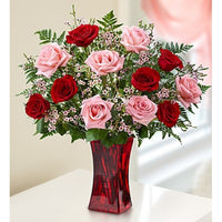 
              Red and pink roses in a red vase for same day fresh flowers delivery by local florist near Livermore,Pleasanton , Dublin
            