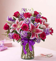 
              Hot pink roses with stargazers, stock and purple fillers Same day flowers delivery by local florist near Livermore, Pleasanton, Dublin
            