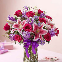 Hot pink roses with stargazers, stock and purple fillers Same day flowers delivery by local florist near Livermore, Pleasanton, Dublin