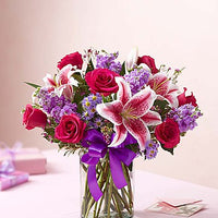 Hot pink roses with stargazers, stock and purple fillers Same day flowers delivery by local florist near Livermore, Pleasanton, Dublin